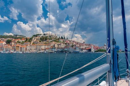 Sailing view of Split, Croatia with historic old town, terracotta rooftops, and Adriatic Sea